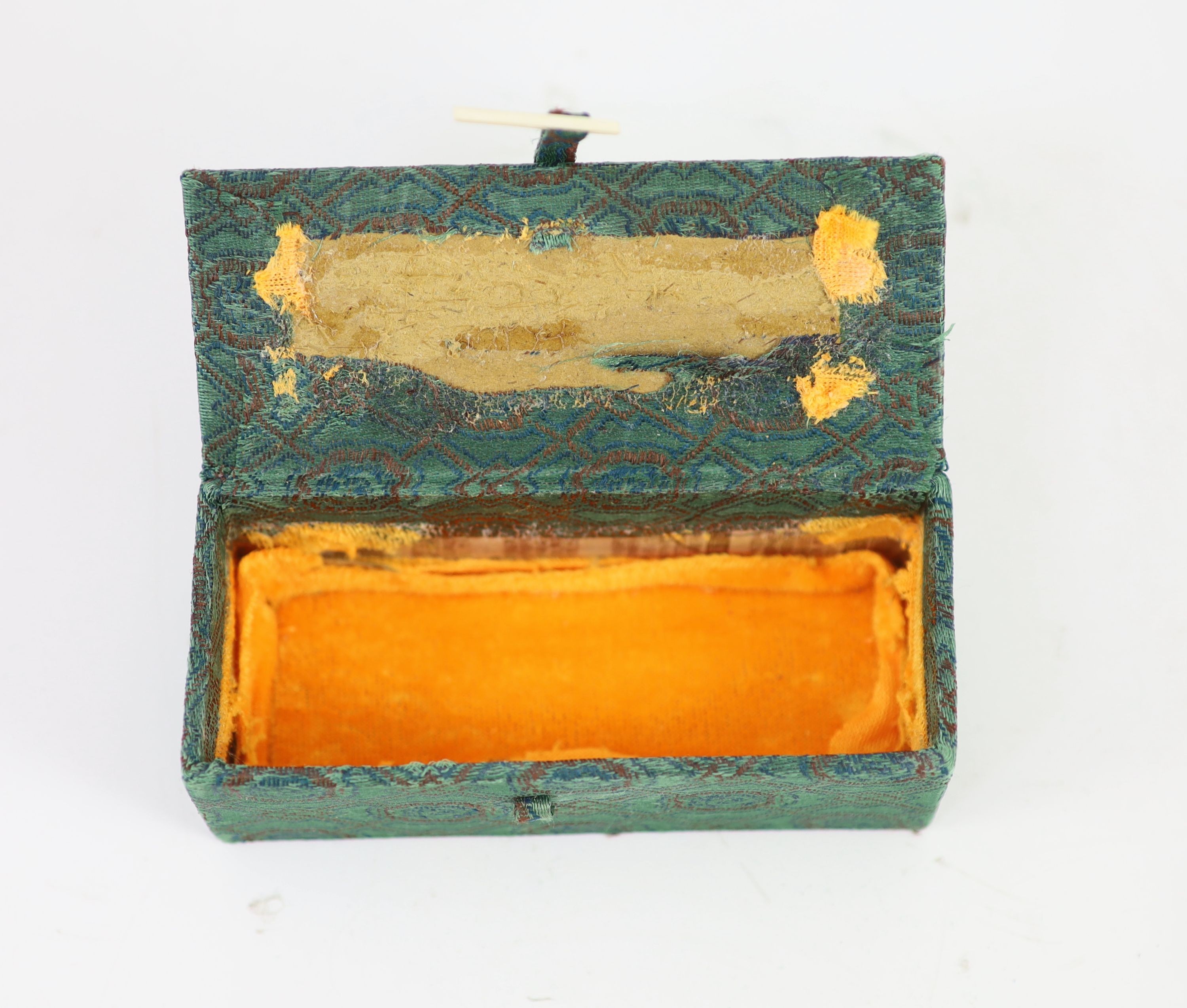 A Chinese ‘chicken bone’ jade carving, 17th/18th century 11 cm long including wood stand